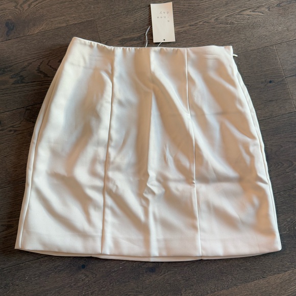 a new day Dresses & Skirts - A new day. Women’s Cream Mini Skirt. NWT size 2